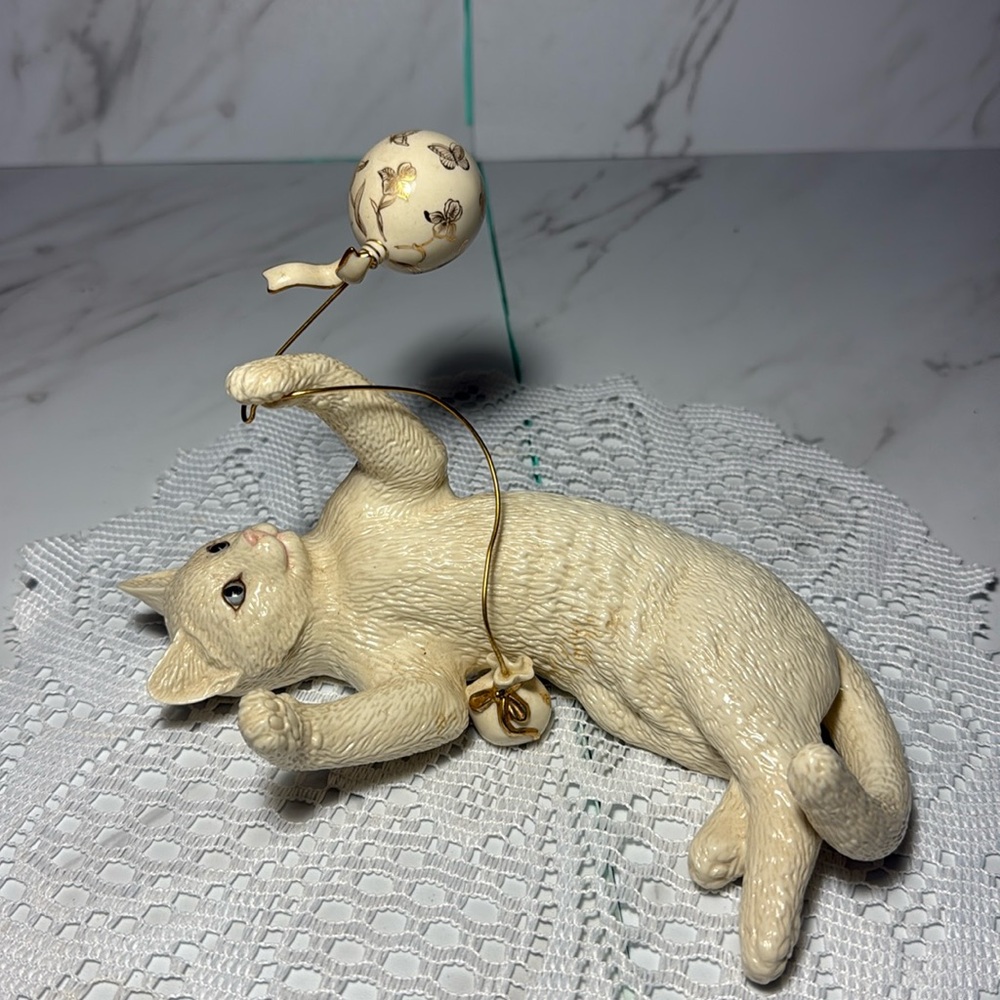 Lenox porcelain kitten with gold accents. Titled captivation.